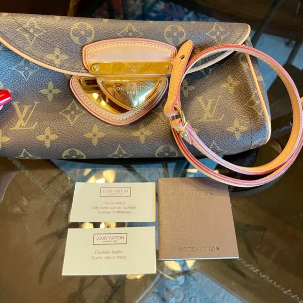 Authentic Louis Vuitton Clutch with strap